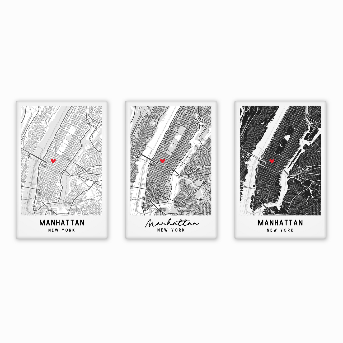 Three framed maps of Manhattan, New York, each with a red heart marker on a white background.
