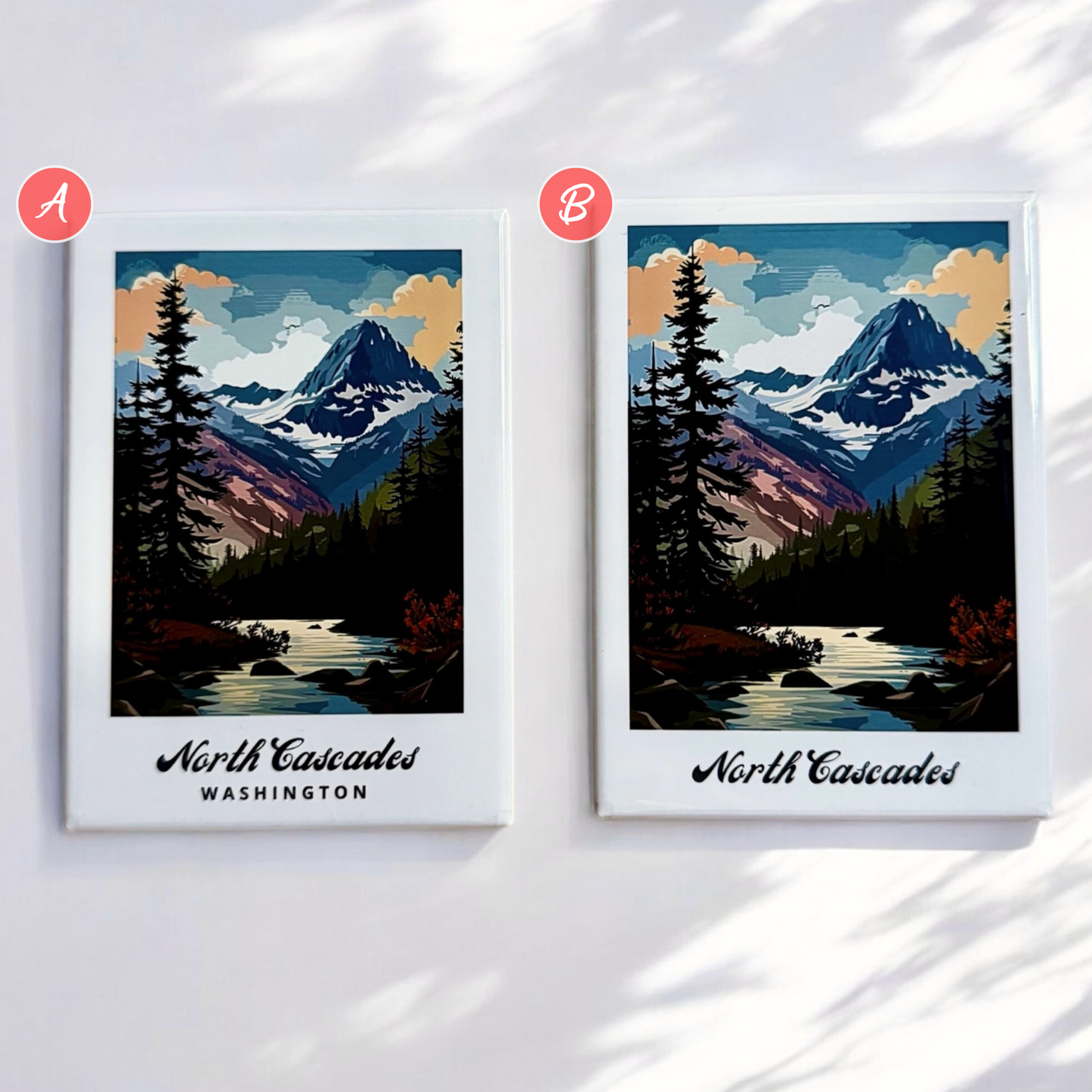 Two design options for magnet layout displaying a white border with the park name and location, the second option includes a thinner white border and just the park name