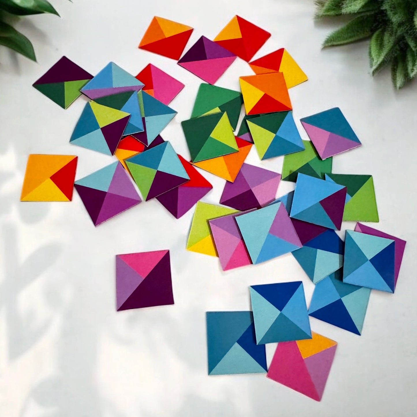 Scattered colored squares for magnetic art designs