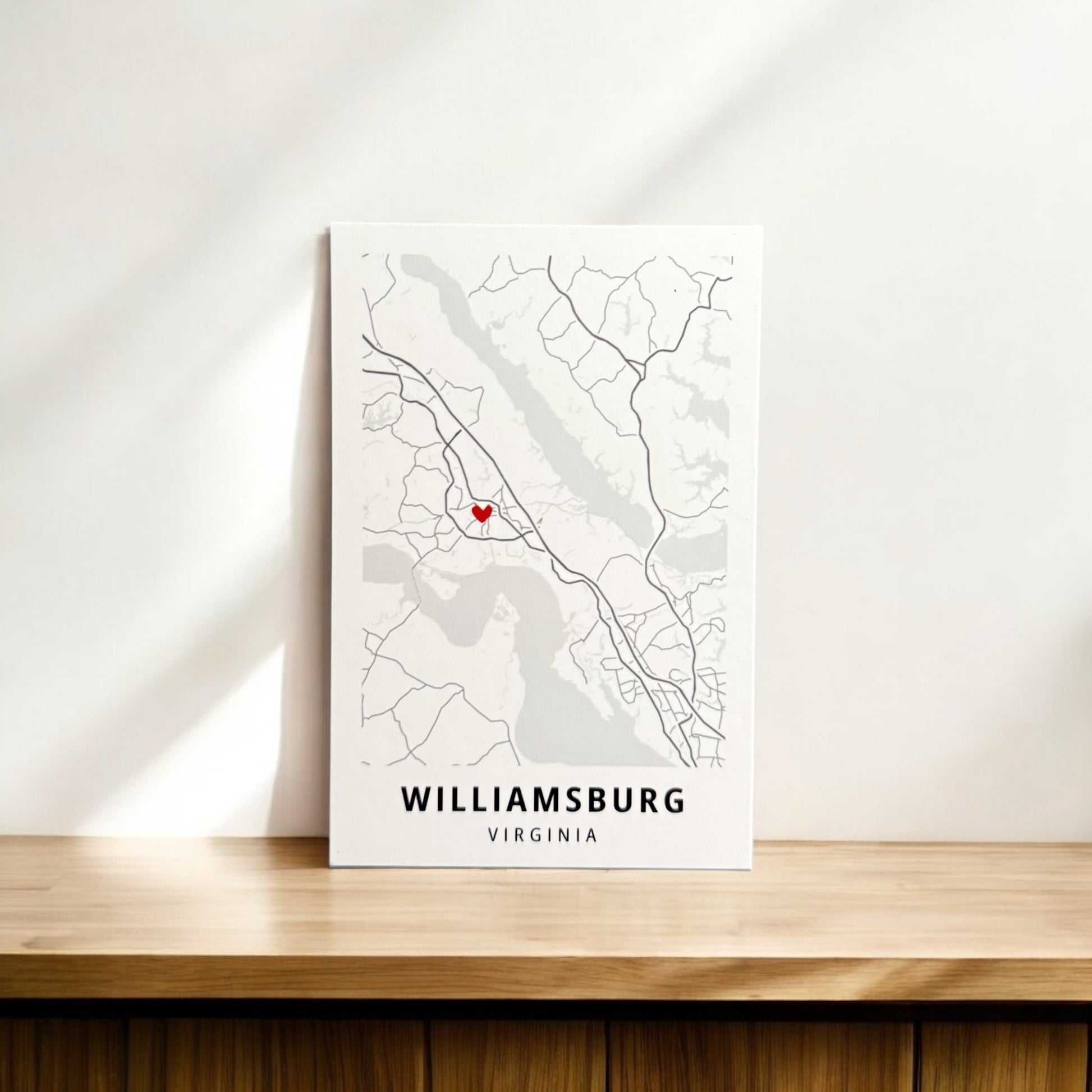 Custom drawn map of a city in Virginia with a red heart marking a special place. Light color theme for modern clean look