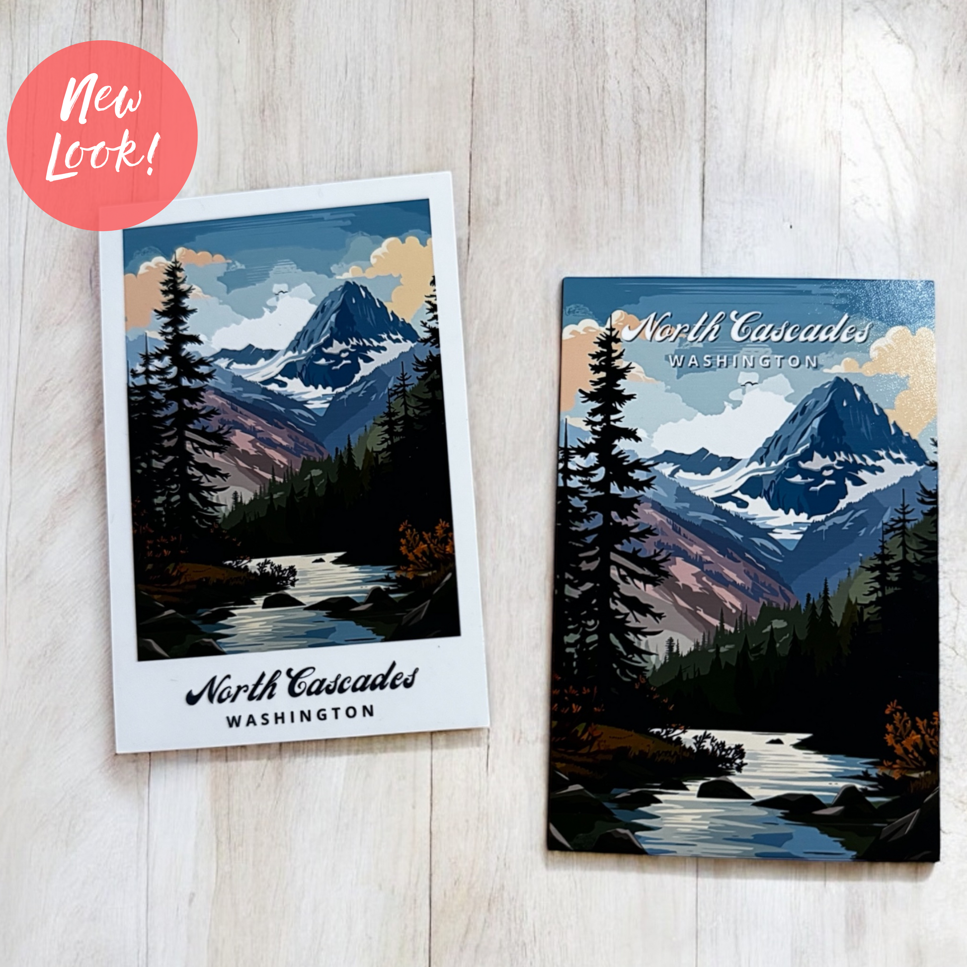 Shows example of North Cascades in Washington with a white border next to a borderless magnet option